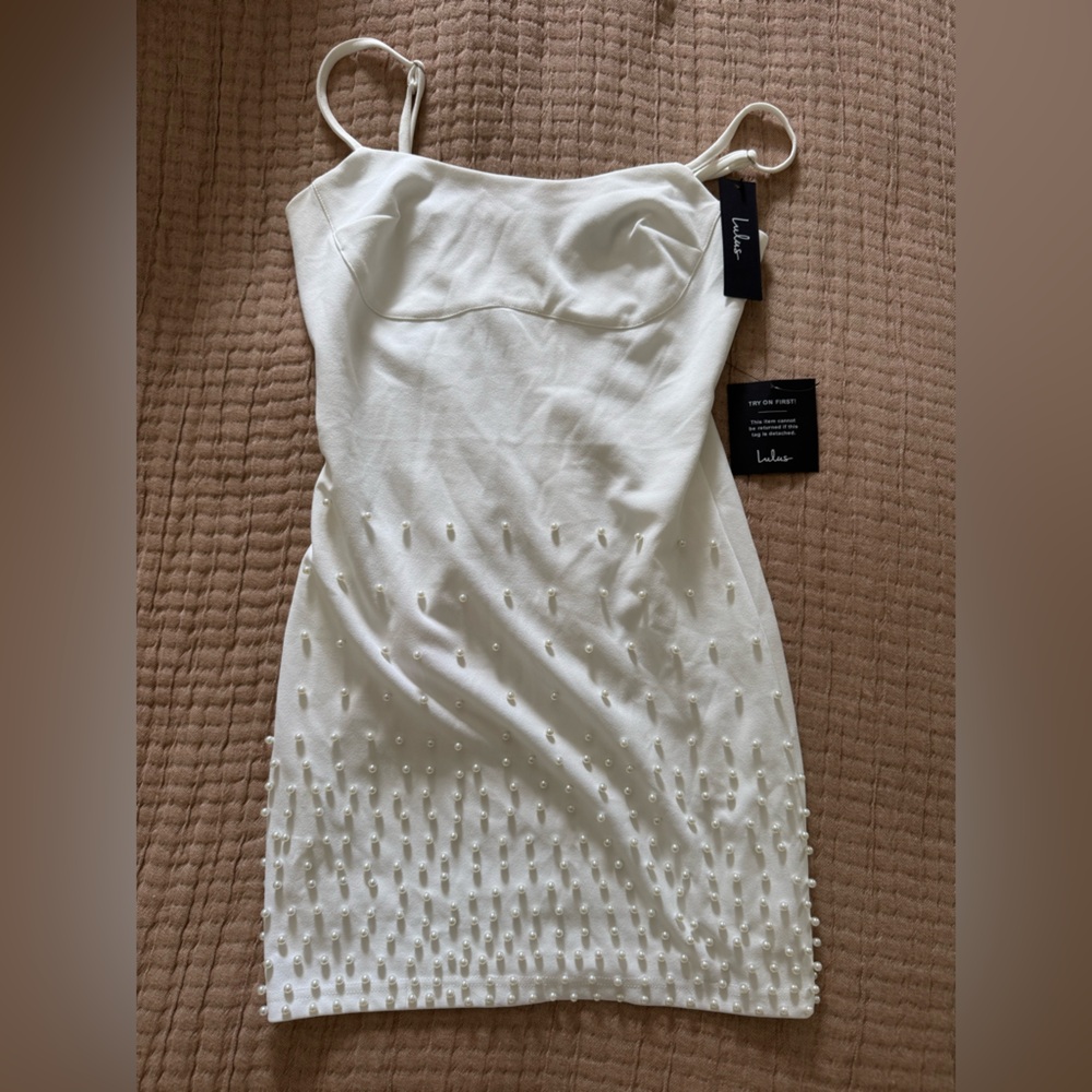 Chic White Mini Dress with Pearl Accents